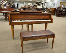 Kimball baby grand in warm pecan cabinet